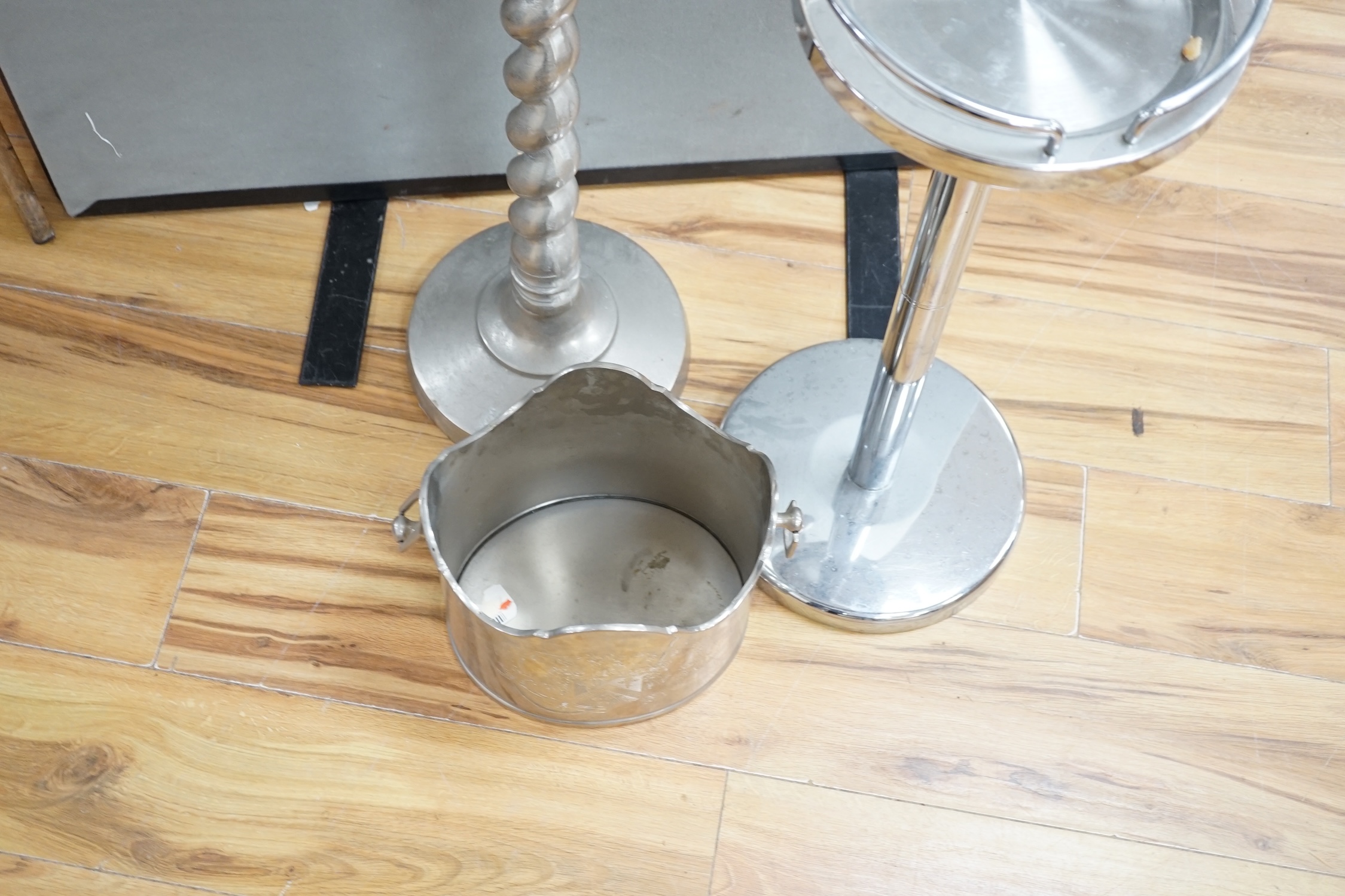 An aluminium stag handled floor standing wine / champagne cooler, another and three table top wine coolers, tallest 86cm high
